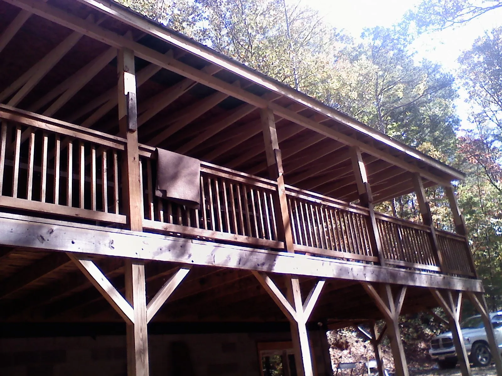 Timber framing under a new elevated porch and deck — Roof Leak Repair in Oriska by Roofing Brothers